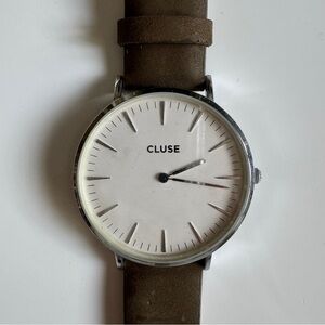 Olive suede strap watch with round silver face